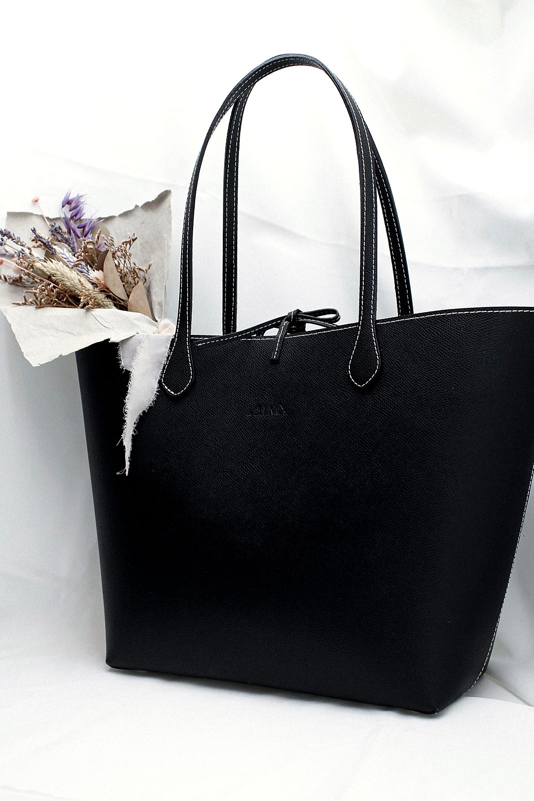 Black leather tote with long handles