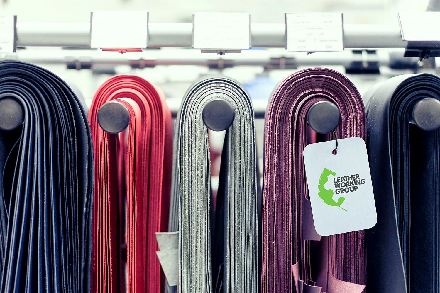 Rolls of leather in stock with a Leather Working Group tag